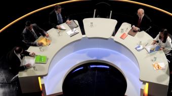 Els sis candidats just abans de començar el debat de diumenge a televisió de Catalunya JOSEP LAGO / AFP