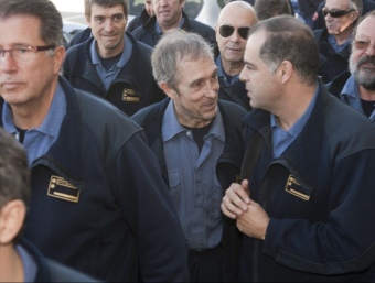 Carles Font, al centre, al jutjat el 13 de gener amb càrrecs dels Bombers. T. VAN DER MEULEN