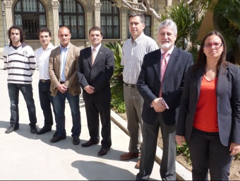 Els candidats. D'esquerra a dreta: Luard Silvestre (CUP), Jordi Bartrolí (ICV), Enric Flamerich (PSC), Joaquim Ferrer (CiU), Norbert Llaràs (SI), Jaume Marfà (PP) i Montse Gual (ERC). Hi falta el candidat del GAMP, Jordi Garcia. LLUÍS ARCAL