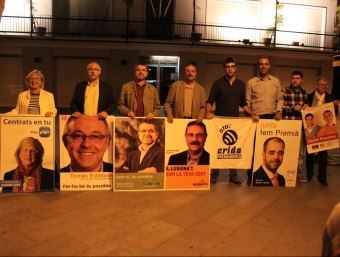 Els candidats de Premià de Mar Juvé (PP), Esteban (PSC), Barreras (ICV-EUiA), Molins (ERC), Ribet (Crida Premianenca), Buch (CiU) i Bernaus i Casanova (Bloc Municipal), a la mitjanit G.A