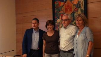 Antonio Báez i Del Frago (PSC), Ramon i Teresa Colomer (CiU), ahir, presentant el pacte E.A