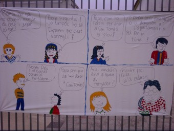 Pancarta de protesta que hi ha penjada a l'escola de Vilobí. AMPA J. MADRENYS