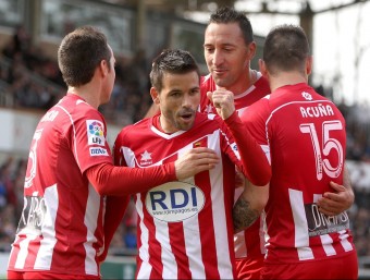 Felipe, celebrant un gol amb David Garcia, Migue i Acuña LLUÍS SERRAT