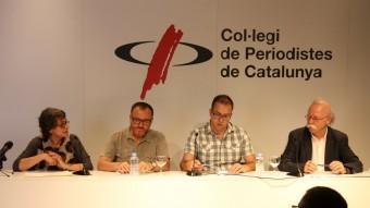 D'esquerra a dreta: Susanna Vela, cap dels arxius d'Andorra; Gabi Barragán, de la XAL, Joan Soler, president dels arxivers de Catalunya i Joan Boadas, director del CRDI de Girona. ACN
