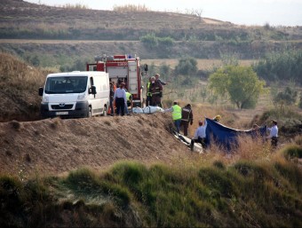 Els Bombers i els Mossos d'Esquadra durant les tasques de rescat dels cossos de les víctimes LAURA CORTÉS / ACN