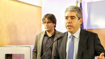 El candidat de Democràcia i Llibertat, Francesc Homs, i l'alcalde de Girona, Carles Puigdemont,aquest dimarts a la seu de CDC ANDREU PUIG