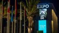 Panell publicitari de la cimera COP28, celebrada a Dubai