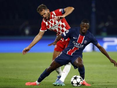 Cristhian Stuani, en una acció del partit d’ahir a París amb Dembélé